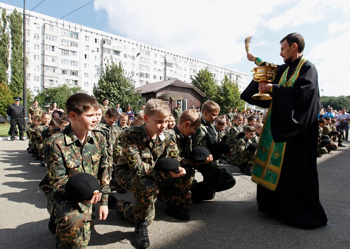 An Orthodox priest blesses cadets at a school in Stavropol in Russia’s North Caucasus, 12 September 2014. Photo: Eduard Kornienko / Reuters / Scanpix / LETA