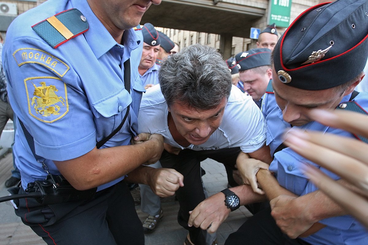 Nemtsov is detained during an opposition rally in Moscow, 31 July 2010. Photo: Igor Kharitonov / EPA